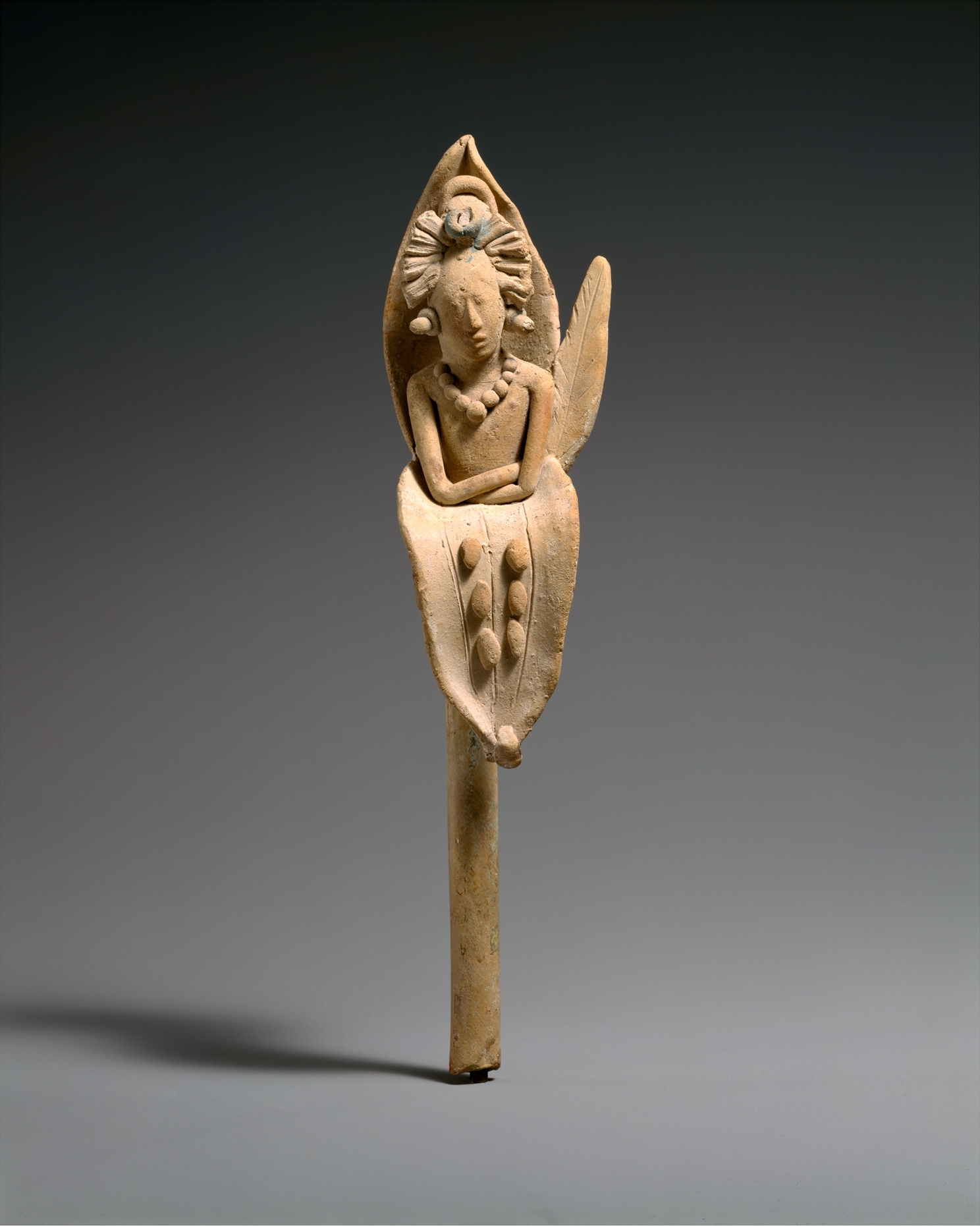 Whistle with the Maize God emerging from a flower
